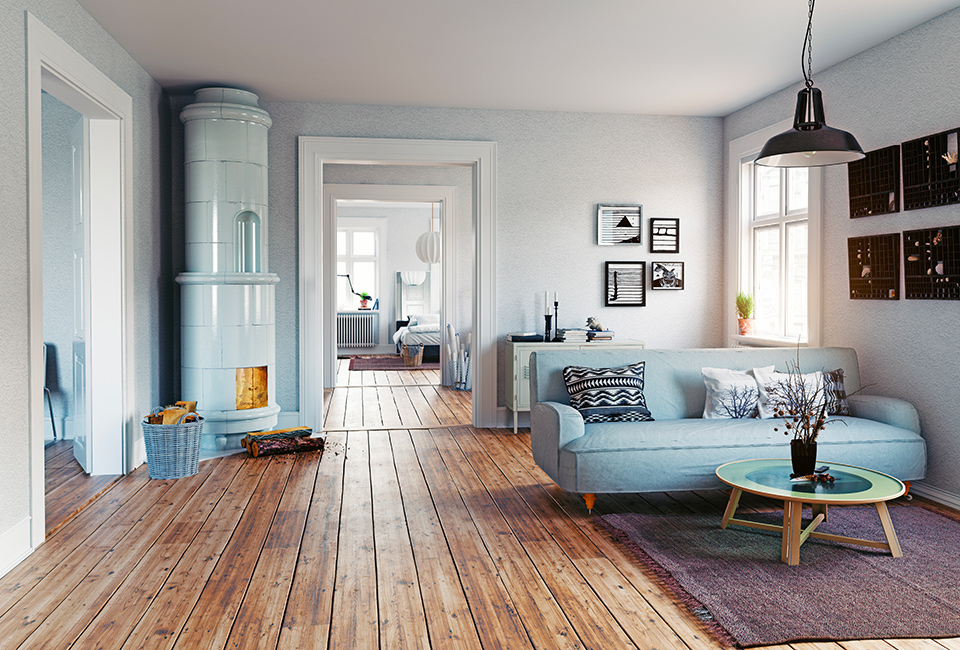 Parquet e tappeti per creare delle “isole”. Arredamento d'interni, vista della casa dal salotto, con parquet e tappeto