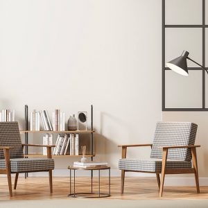 Salotto elegante e minimale con mobili in legno in stile scandinavo e parquet in acero