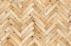 Un parquet in larice disposto con disegno a spina di pesce