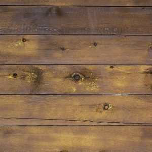 Un vecchio parquet che presenta dei difetti del legno