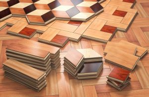 Elementi di parquet geometrico, alcuni da posare e altri già posati