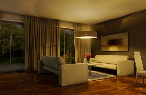 Salotto con atmosfera soffusa e parquet in merbau
