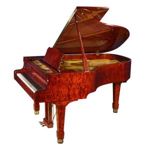 Un pianoforte a coda in legno di bubinga
