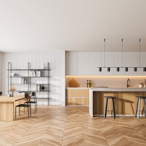 Un luminoso open space con cucina e sala da pranzo