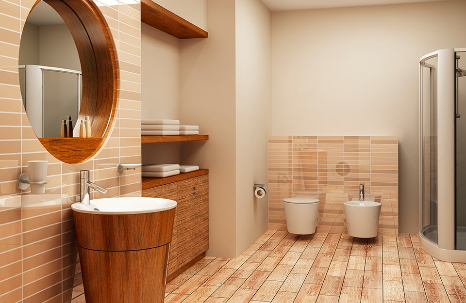 Bagno moderno con sanitari tondeggianti, piastrelle beige e pavimento in grès effetto legno