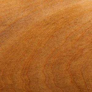 Dettaglio sulla texture di una tavolo in legno di madrone del Pacifico